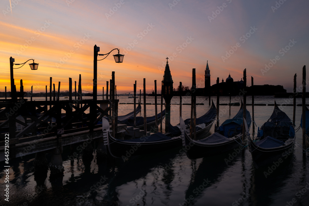 A new day among the Gondeles, Riva degli Schiavoni Venice Italy