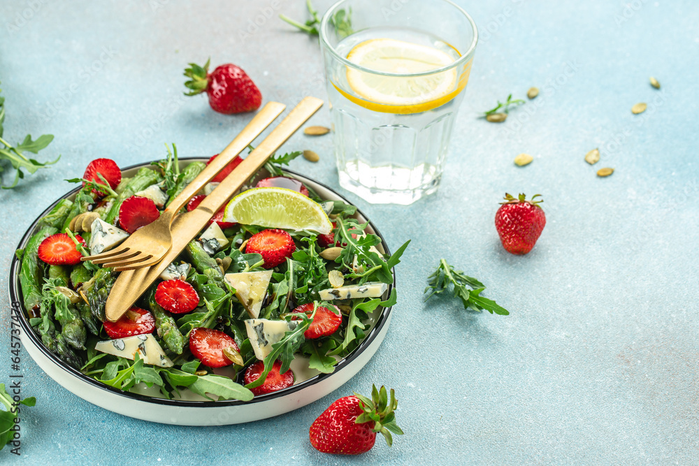 Strawberry, Asparagus Salad. Delicious breakfast or snack, Clean eating, dieting, vegan food concept. top view