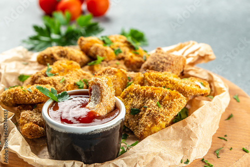 crispy homemade baked chicken nuggets on a light background, banner, menu, recipe place for text, top view