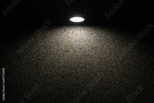 Fototapeta Naklejka Na Ścianę i Meble -  Exterior illuminated wall light modern Nordic style. Balcony LED wall light illuminated on textured concrete wall at night. Black glowing lamp hanging on the wall. Selective focus and copy space.