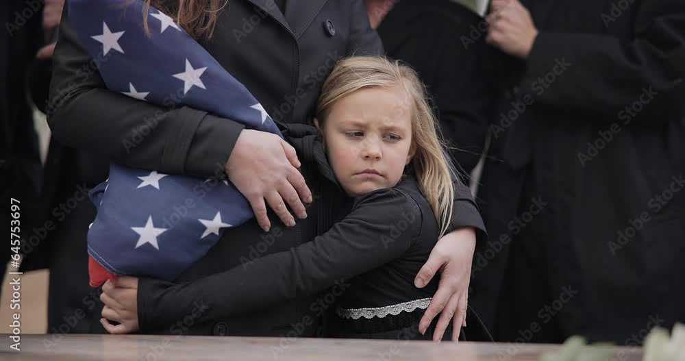 USA veteran funeral, girl and sad family with hug, care and flag for mourning, depression and comfort with mom. Kid, people and service with coffin, burial or memorial with war hero in Philadelphia USA veteran funeral, girl and sad family with hug, care and flag for mourning, depression and comfort with mom. Kid, people and service with coffin, burial or memorial with war hero in Philadelphia