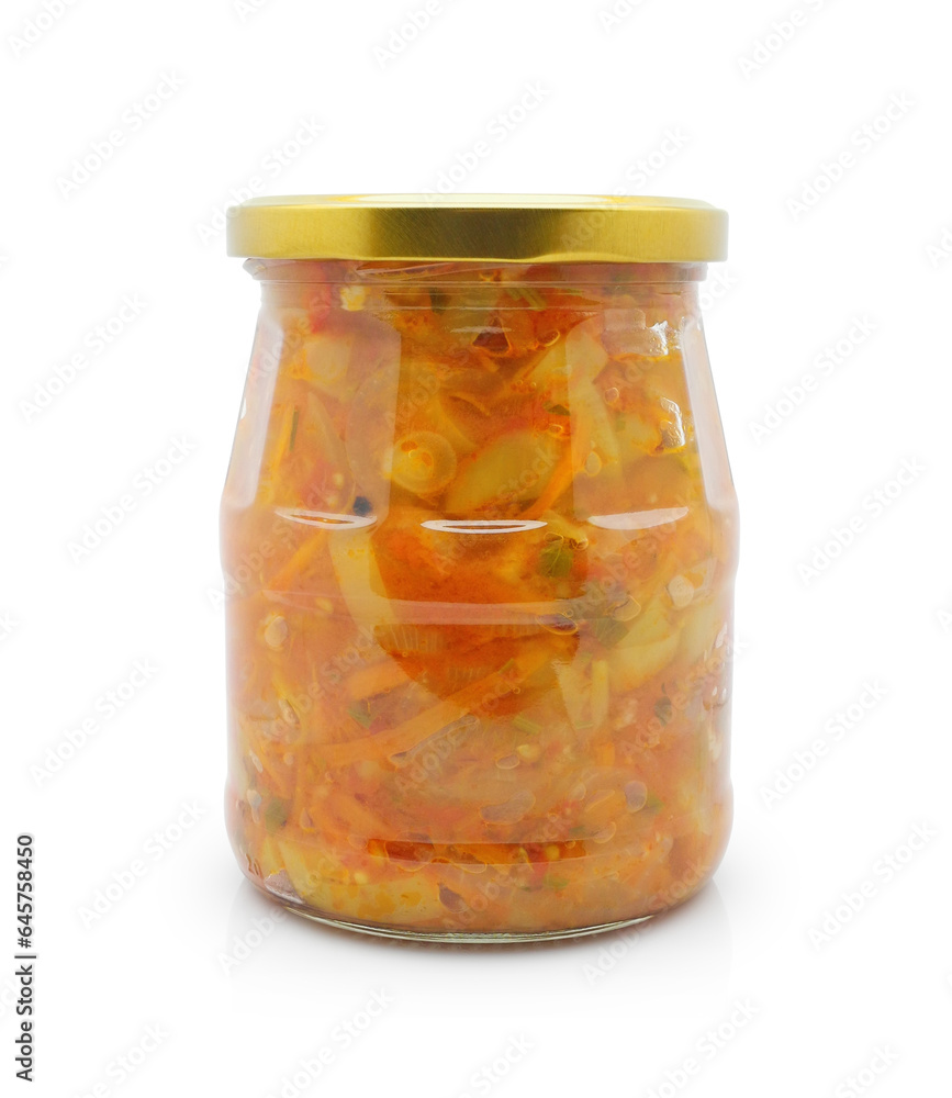 Homemade canned vegetables in glass jar for long-term storage. Salad from sweet pepper, carrot, onion, tomatoes and parsley, healthy winter snack. Isolated on white background. Homemade canned vegetables in glass jar for long-term storage. Salad from sweet pepper, carrot, onion, tomatoes and parsley, healthy winter snack. Isolated on white background.