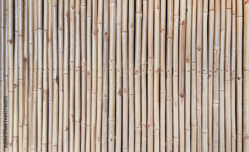 architectural bamboo wall for japanese mood decoration for interior or exterior design. old bamboo plank fence texture used as background with blank space for design.
