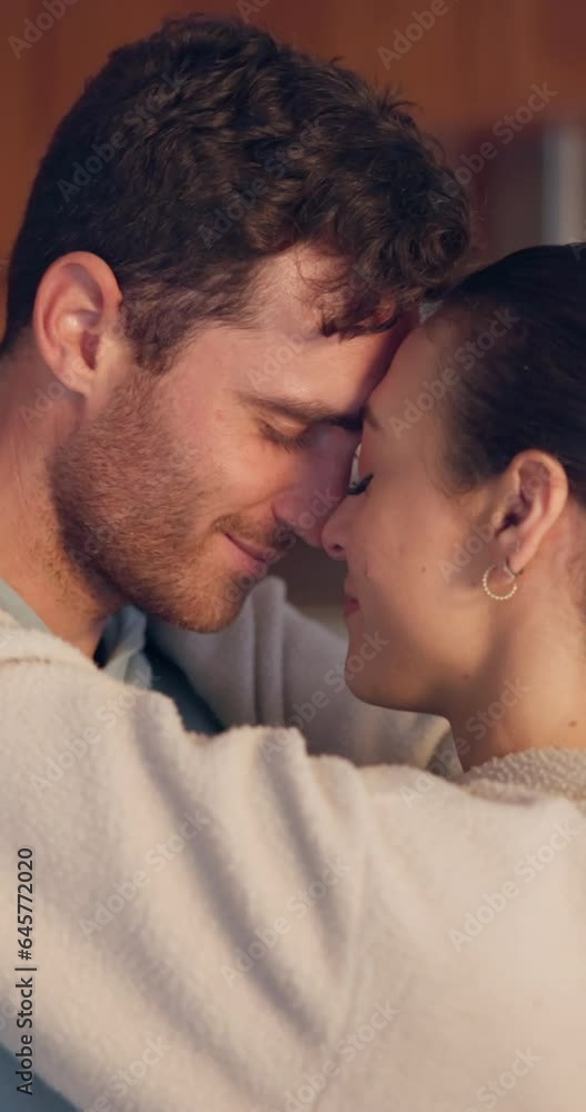 Forehead, care or happy couple hug in kitchen for romance, love or bond together in an intimate connection. Eye contact, man or romantic woman in embrace to celebrate marriage anniversary at home Forehead, care or happy couple hug in kitchen for romance, love or bond together in an intimate connection. Eye contact, man or romantic woman in embrace to celebrate marriage anniversary at home