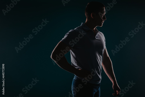 Handsome and muscular man posing © qunica.com