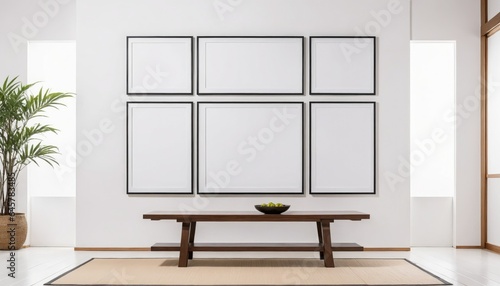 Six empty picture frames hanging on a white wall. Concept mockup.
