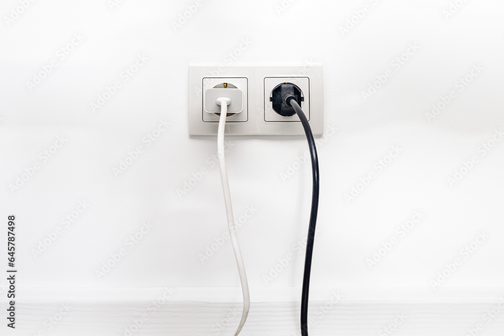 White double outlet on white wall White double outlet on white wall