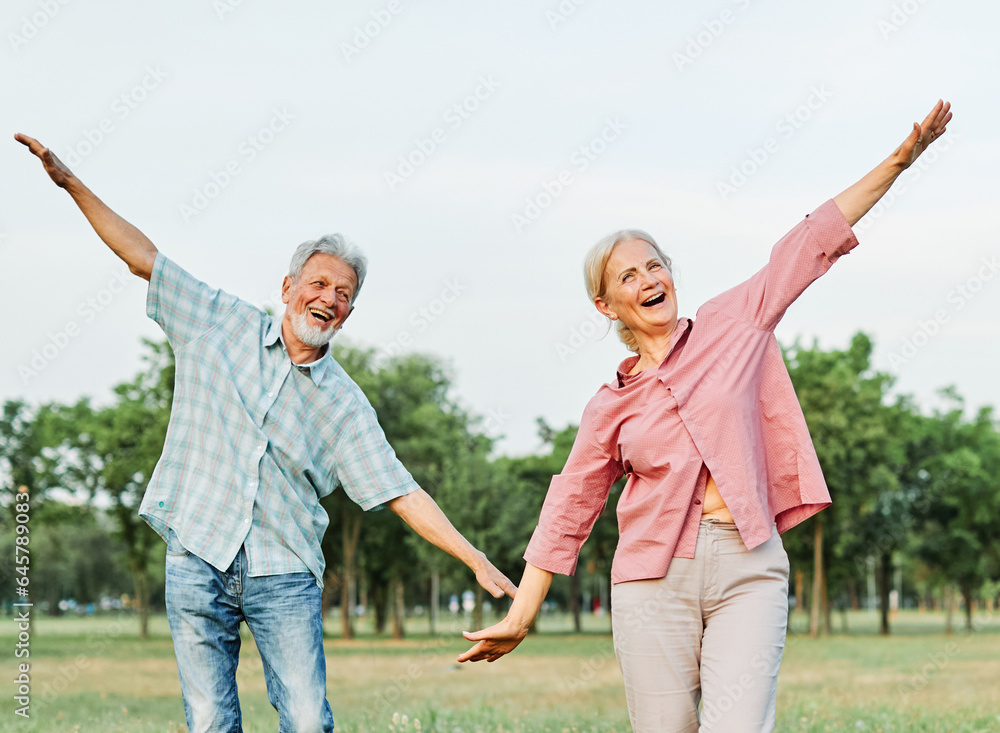 woman man senior couple happy retirement together elderly active freedom vitality bonding park outdoor leisure park fun smiling love old nature wife happiness mature woman man senior couple happy retirement together elderly active freedom vitality bonding park outdoor leisure park fun smiling love old nature wife happiness mature