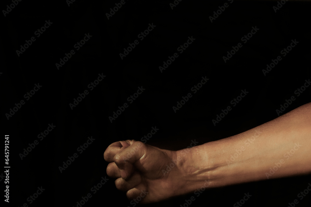 Fist pounding on the table. Dark key. Fist pounding on the table. Dark key.