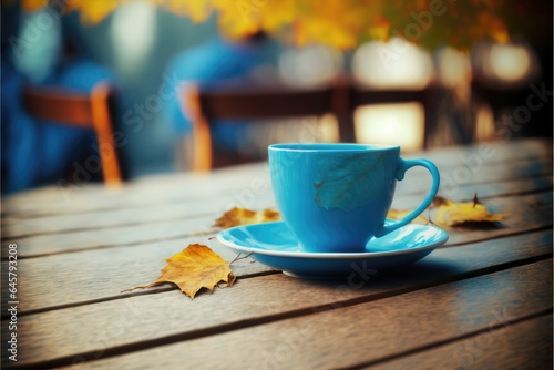 Focus blue color of coffee cup on wooden table with blurred autumn background. Concept of blank space for advertising product. Finest generative AI.