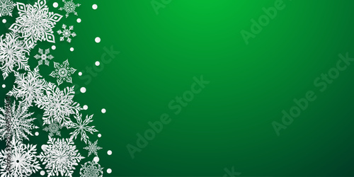 Christmas illustration with beautiful complex paper snowflakes, white on green background