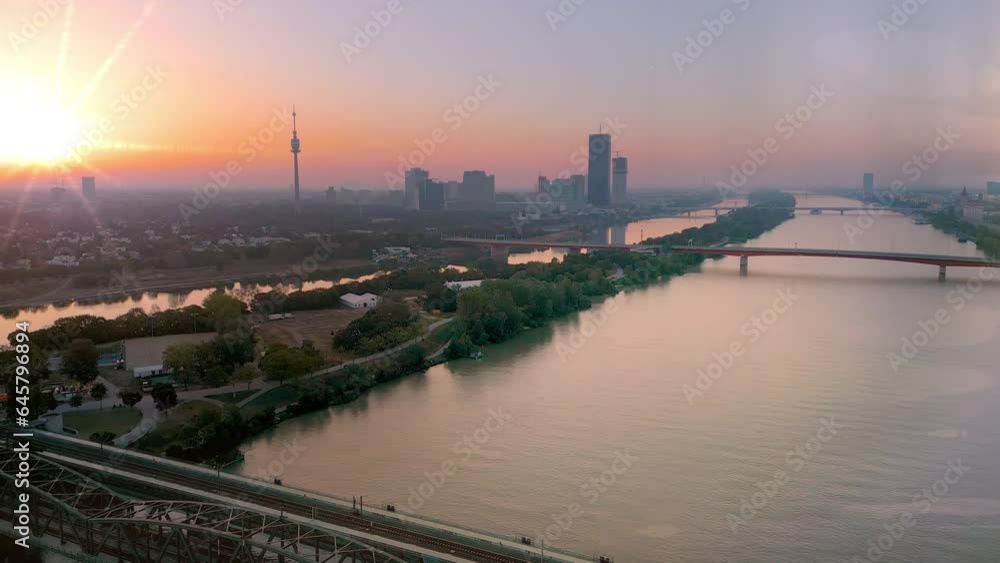 Vienna Austria ctiy skyline aerial view fly over river and bridge in front vienna skyscrapers tv towerview from above. Vienna Austria ctiy skyline aerial view fly over river and bridge in front vienna skyscrapers tv towerview from above.