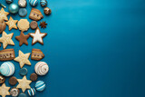 Hanukkah composition on blue background with menorah candles, dreidels, gelt coins and star of David cookies. Jewish festival of lights theme. Restangular Hanukkah background