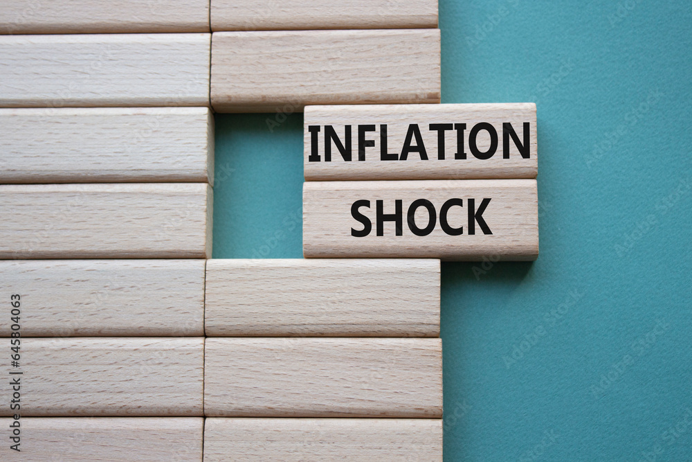 Inflation Shock symbol. Wooden blocks with words Inflation Shock. Beautiful grey green background. Business and Inflation Shock concept. Copy space. Inflation Shock symbol. Wooden blocks with words Inflation Shock. Beautiful grey green background. Business and Inflation Shock concept. Copy space.