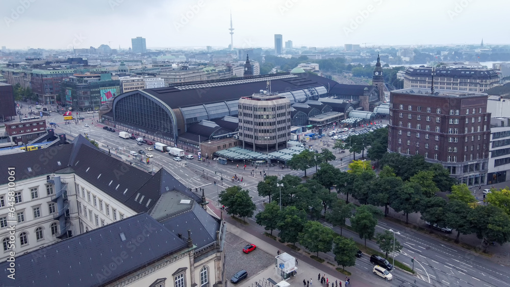 Aerial view on Main train Staion of Hamburg and street  with cars and people walking and Communications