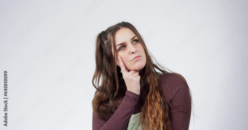 Ideas, thinking and woman with solution, planning and confused on a white studio background. Person, girl and model with problem solving, doubt and fantasy with a decision, choice and questions Ideas, thinking and woman with solution, planning and confused on a white studio background. Person, girl and model with problem solving, doubt and fantasy with a decision, choice and questions