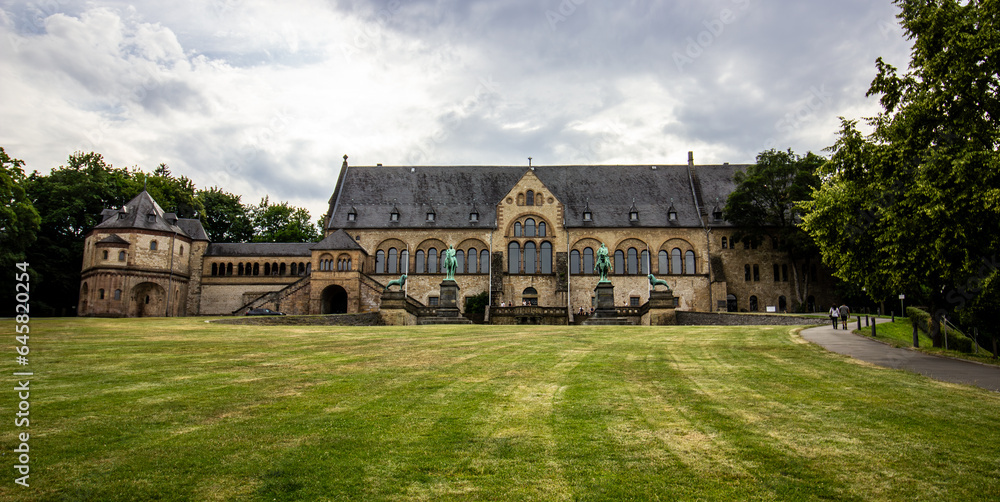 The famous Imperial palace of Goslar is known as Kaiserpfalz. View of the place in cloudy weather. Goslar, Lower Saxony, Niedersachsen, Germany. The famous Imperial palace of Goslar is known as Kaiserpfalz. View of the place in cloudy weather. Goslar, Lower Saxony, Niedersachsen, Germany.