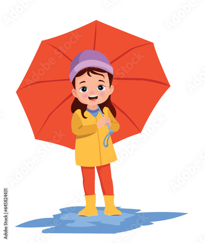 cute boy wearing a raincoat holding an umbrella