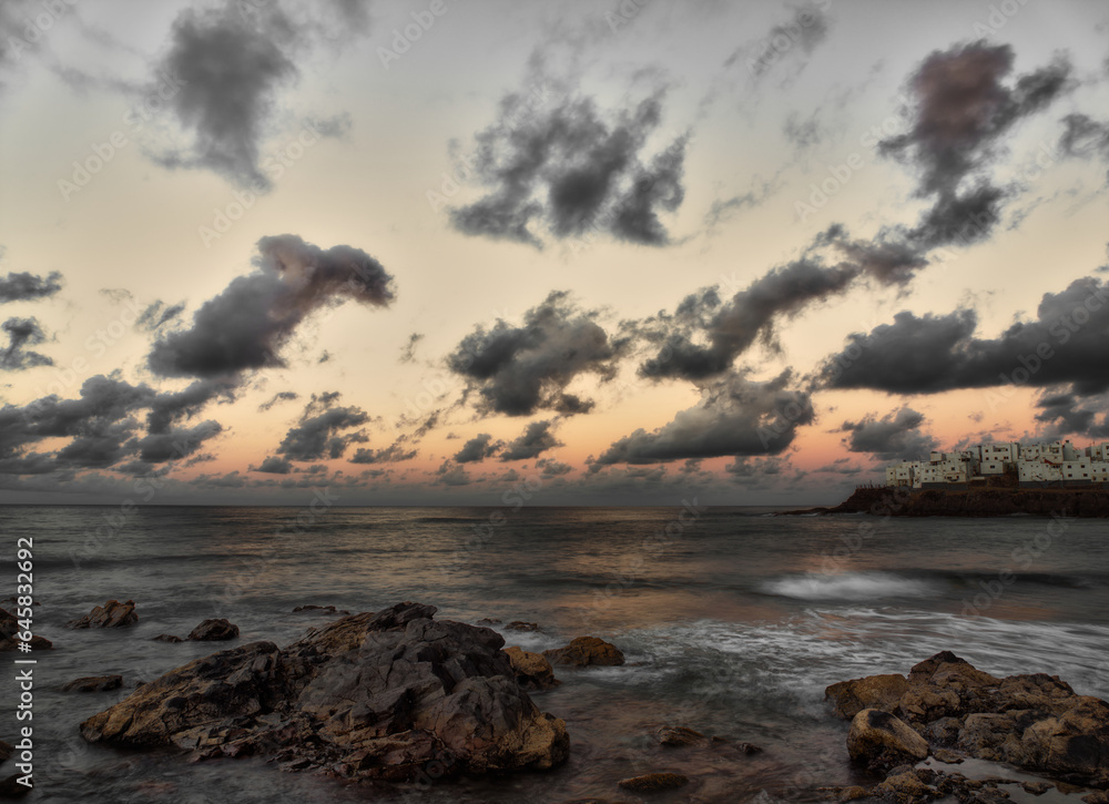 Seascape at sunset with clouds