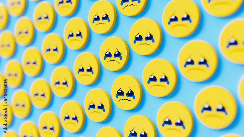 buttons with sad yellow faces with tears on blue wall, theme for social networks and emotions buttons with sad yellow faces with tears on blue wall, theme for social networks and emotions