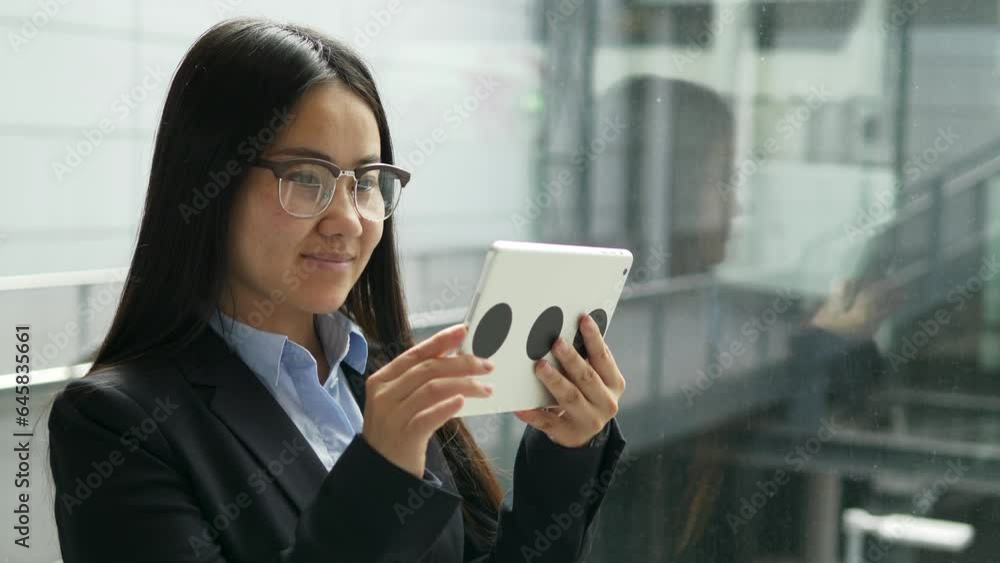 Asian Female Person Working in Finance Traveling on Business Trip Asian Female Person Working in Finance Traveling on Business Trip