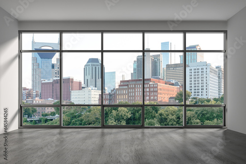 Downtown Nashville City Skyline Buildings from High Rise Window. Beautiful Expensive Real Estate overlooking. Epmty room Interior Skyscrapers View Cityscape. Day time Tennessee. 3d rendering. © VideoFlow