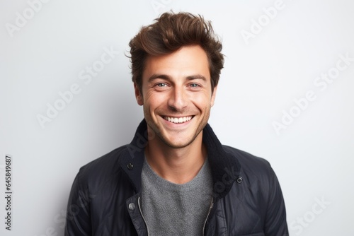 Portrait photography of a French man in his 20s against a white background
