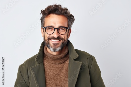 Medium shot portrait photography of a Italian man in his 30s against a white background