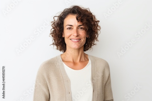 Portrait photography of a Italian woman in her 40s against a white background