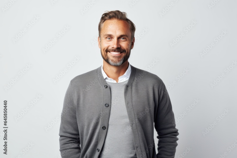 Medium shot portrait photography of a Swedish man in his 30s against a white background Medium shot portrait photography of a Swedish man in his 30s against a white background