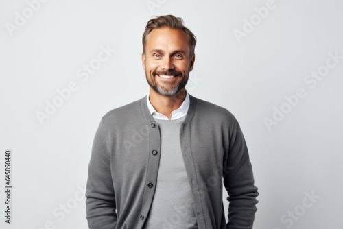 Medium shot portrait photography of a Swedish man in his 30s against a white background