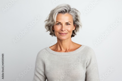 Portrait photography of a Swedish woman in her 40s against a white background