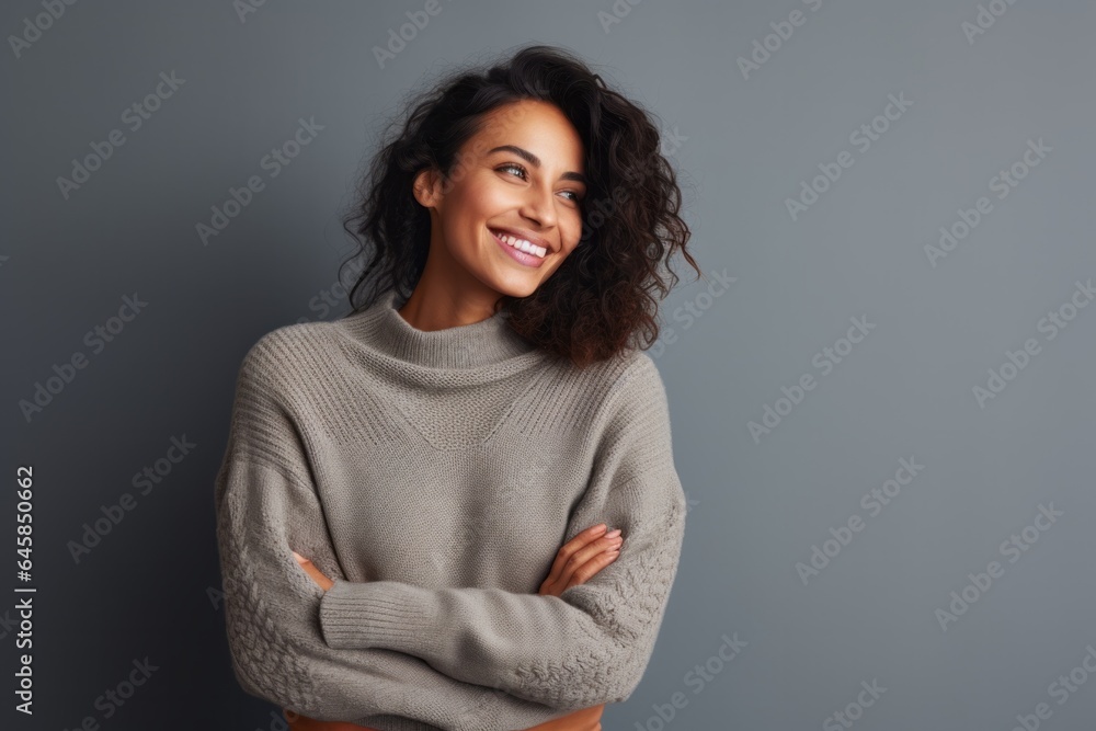 Portrait photography of a Peruvian woman in her 30s wearing a cozy sweater against a minimalist or empty room background Portrait photography of a Peruvian woman in her 30s wearing a cozy sweater against a minimalist or empty room background