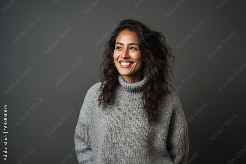Portrait photography of a Peruvian woman in her 30s wearing a cozy sweater against a minimalist or empty room background Portrait photography of a Peruvian woman in her 30s wearing a cozy sweater against a minimalist or empty room background