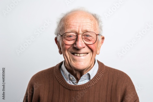 Portrait photography of a Swedish man in his 80s against a white background