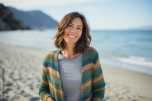 Portrait photography of a Italian woman in her 40s against a beach background