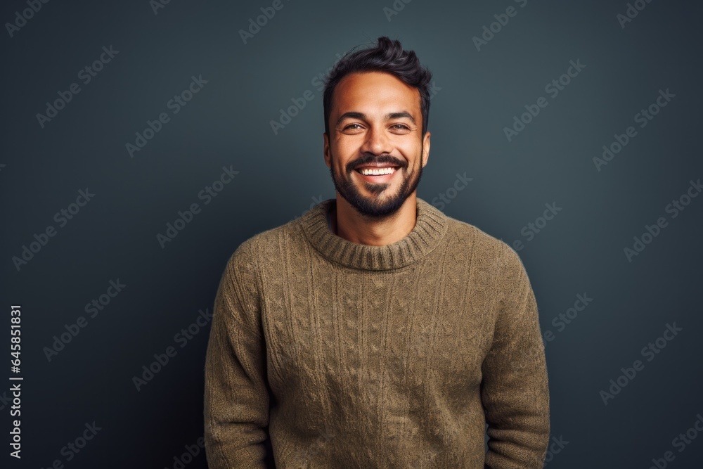 Portrait photography of a Peruvian man in his 30s wearing a cozy sweater against an abstract background Portrait photography of a Peruvian man in his 30s wearing a cozy sweater against an abstract background