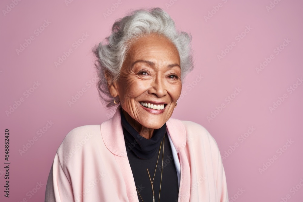 Medium shot portrait photography of a Peruvian woman in her 90s against a pastel or soft colors background Medium shot portrait photography of a Peruvian woman in her 90s against a pastel or soft colors background