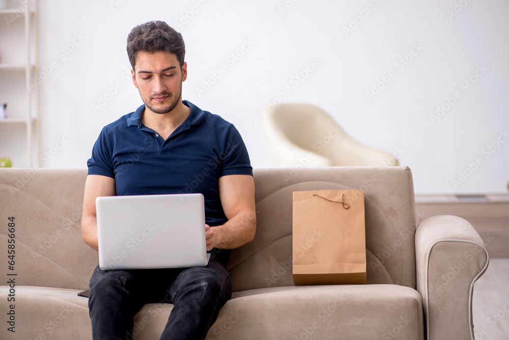 Young male freelancer working from home Young male freelancer working from home