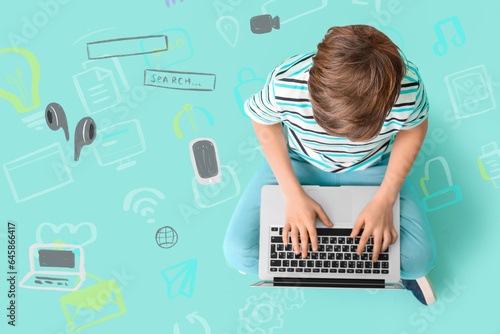 Sitting little boy with lap...