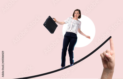 Balancing young businesswom...