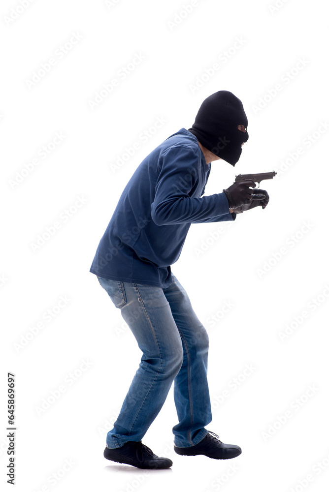 Young male burglar holding handgun isolated on white Young male burglar holding handgun isolated on white