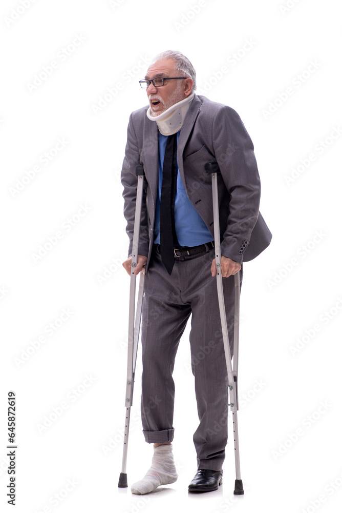 Old businessman after car accident isolated on white Old businessman after car accident isolated on white
