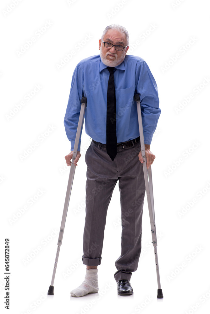 Old businessman with crutches isolated on white Old businessman with crutches isolated on white