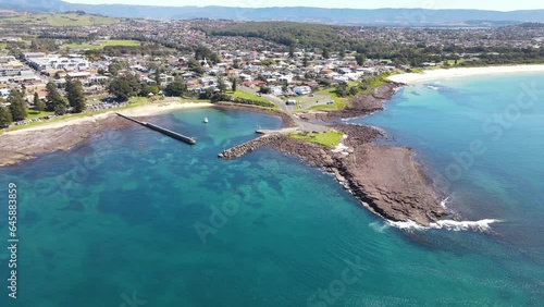 Aerial drone view of Shellharbour heading toward Shellharbour North Beach on the New South Wales South Coast, Australia on a sunny day  photo