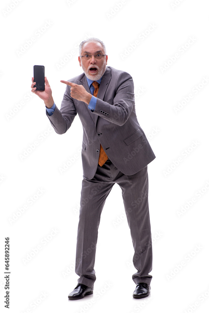 Old businessman talking by phone isolated on white Old businessman talking by phone isolated on white