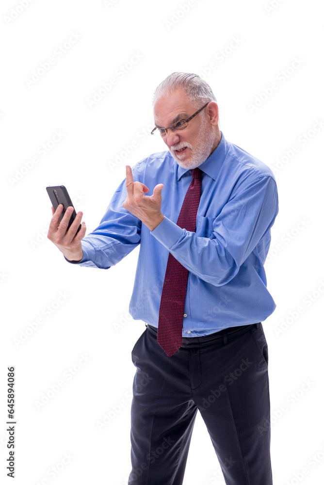 Old businessman talking by phone isolated on white Old businessman talking by phone isolated on white