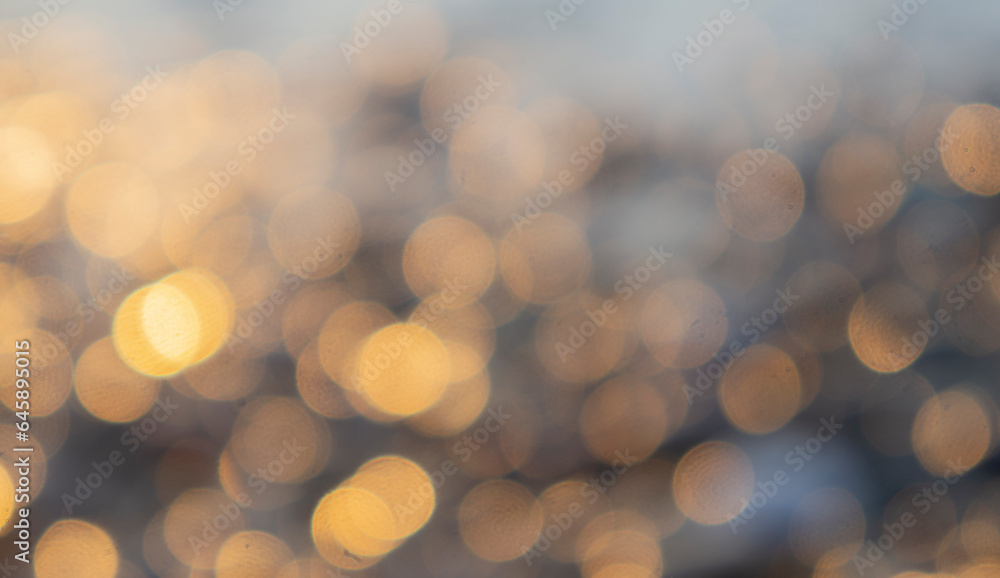 Abstract background. Gold blurred bokeh.  Holiday mood, luxury gold. Overlay for design. Copy space