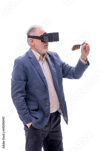 Old male writer wearing virtual glasses isolated on white