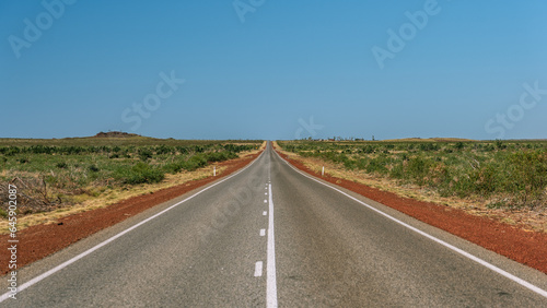 Outback road in Western Australia along the Great Northern Hwy photo